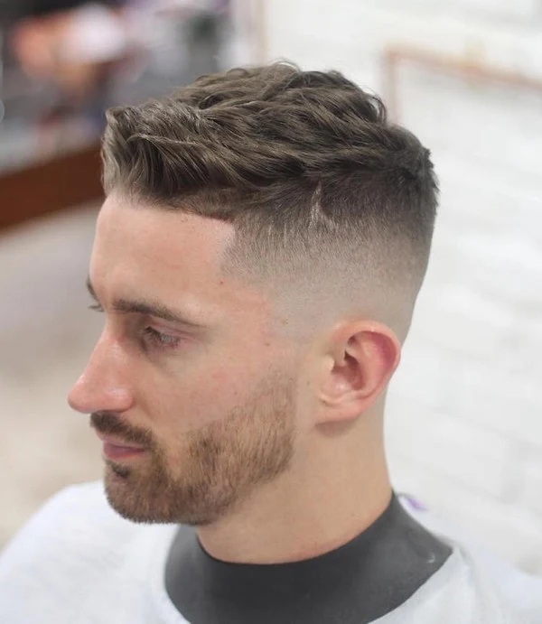Side profile of a modern fade haircut