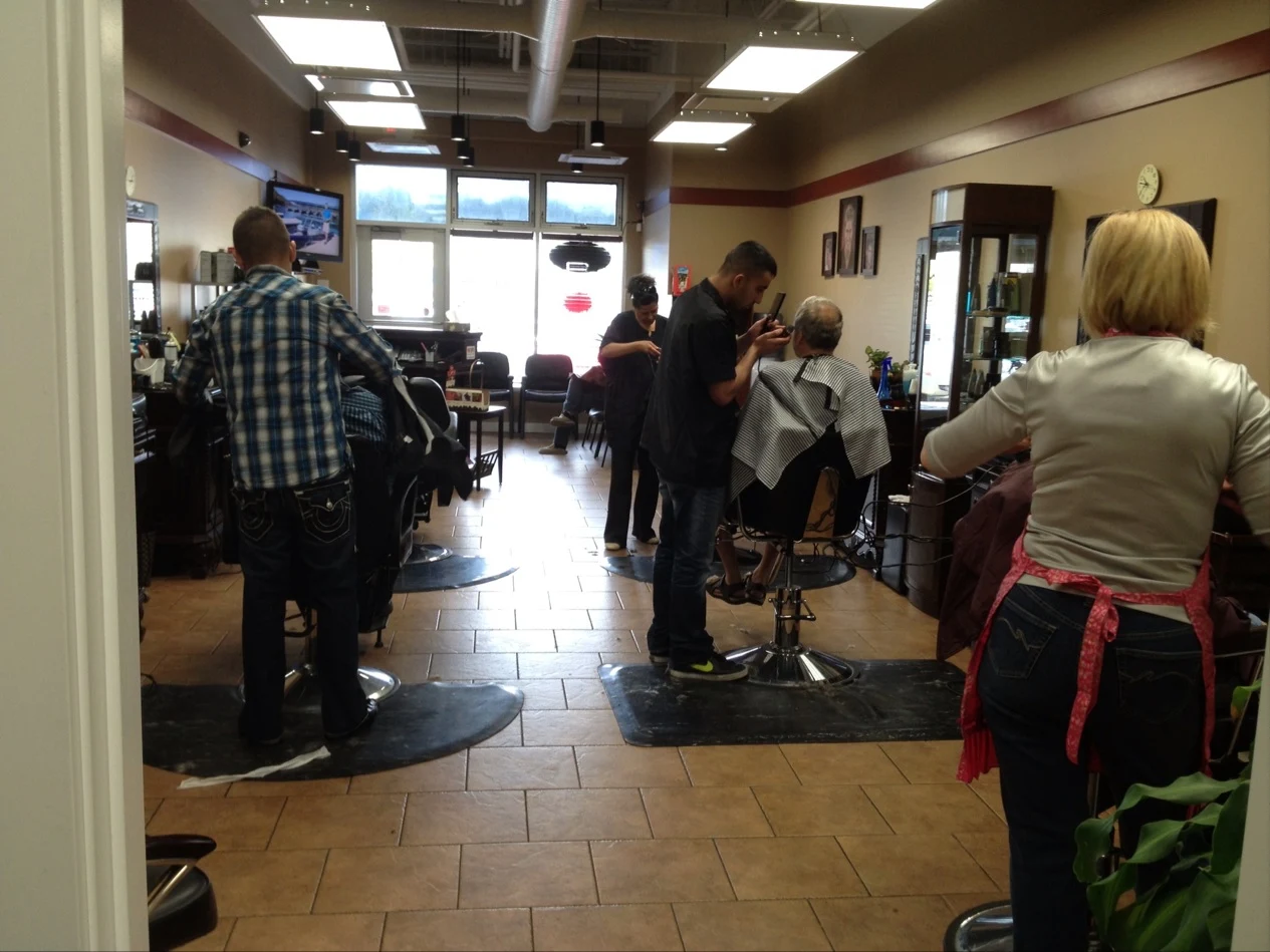 Inside Deer Valley Barber Shop with barbers at work